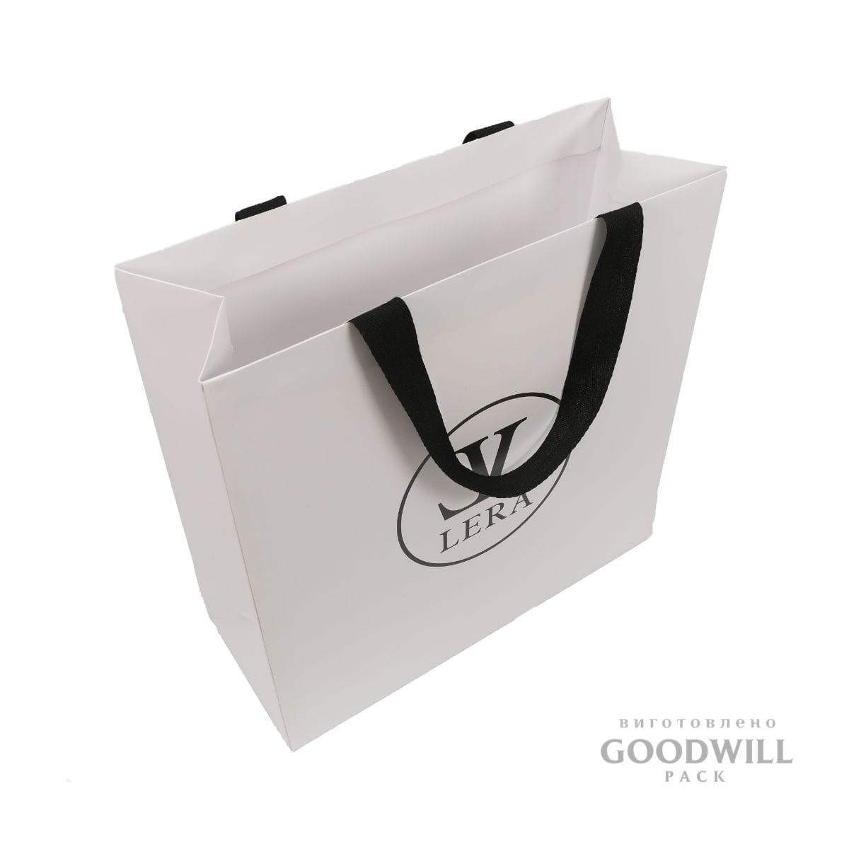 Пакет картонний з вклеєними ручками фотографія