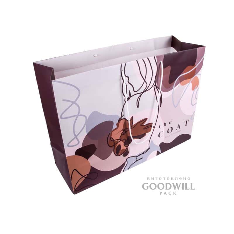 Пакет паперовий з мелованного пареру з повнокольровим друком фотографія