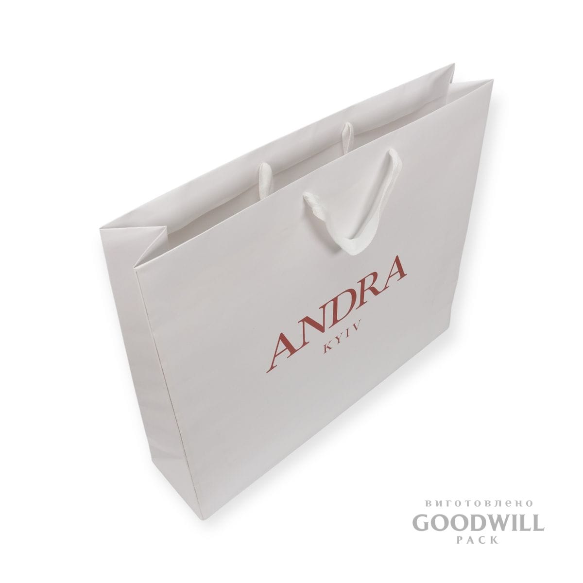 Пакет паперовий з логотипом для одягу з друком логотипа фото