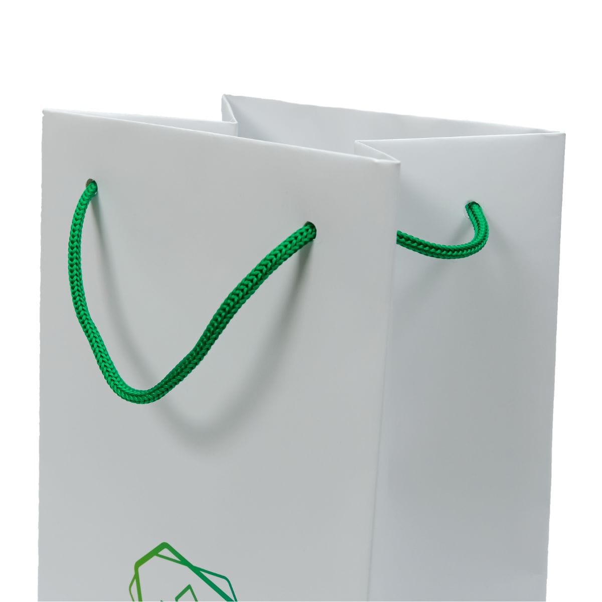 Ручка шнурок на паперовому білому пакеті фото