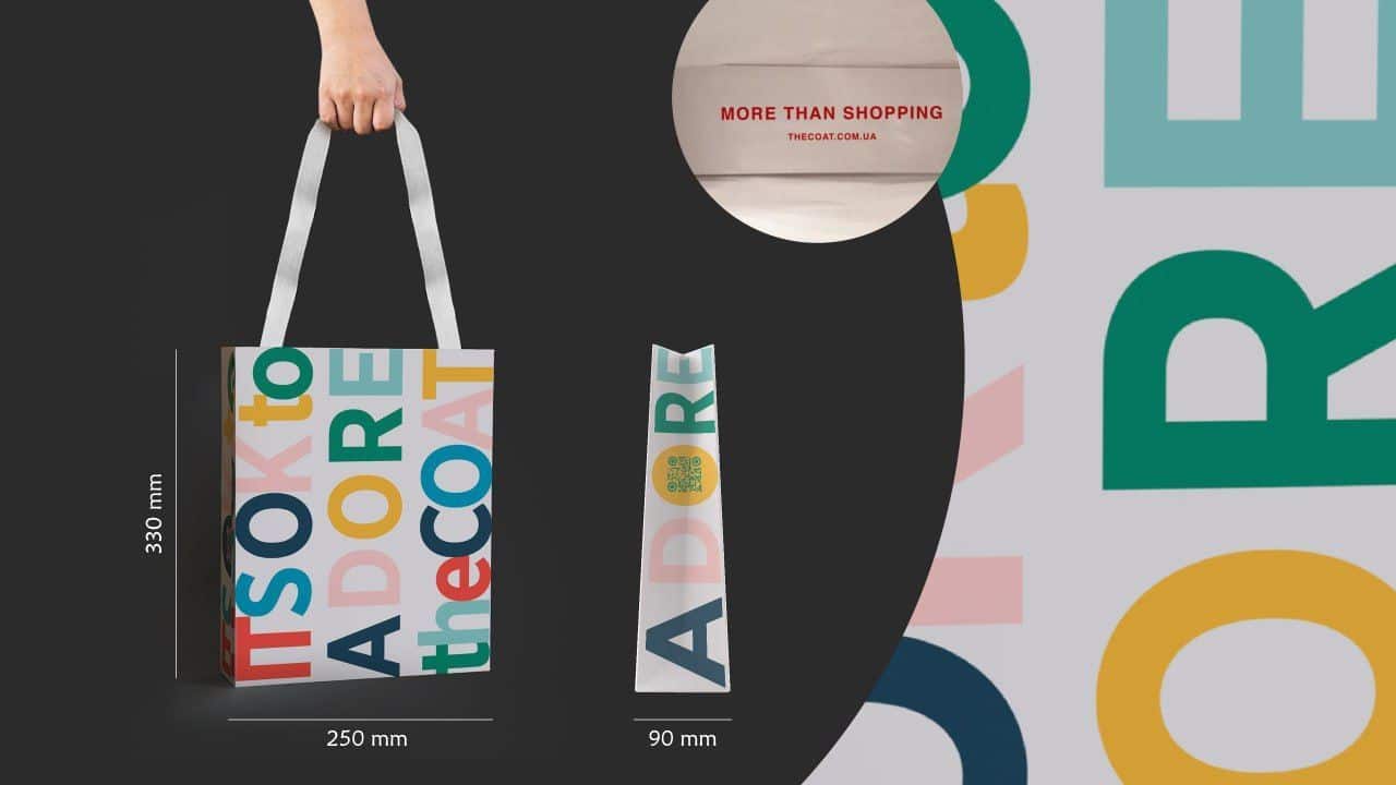 Брендовий пакет з ручками фотографія