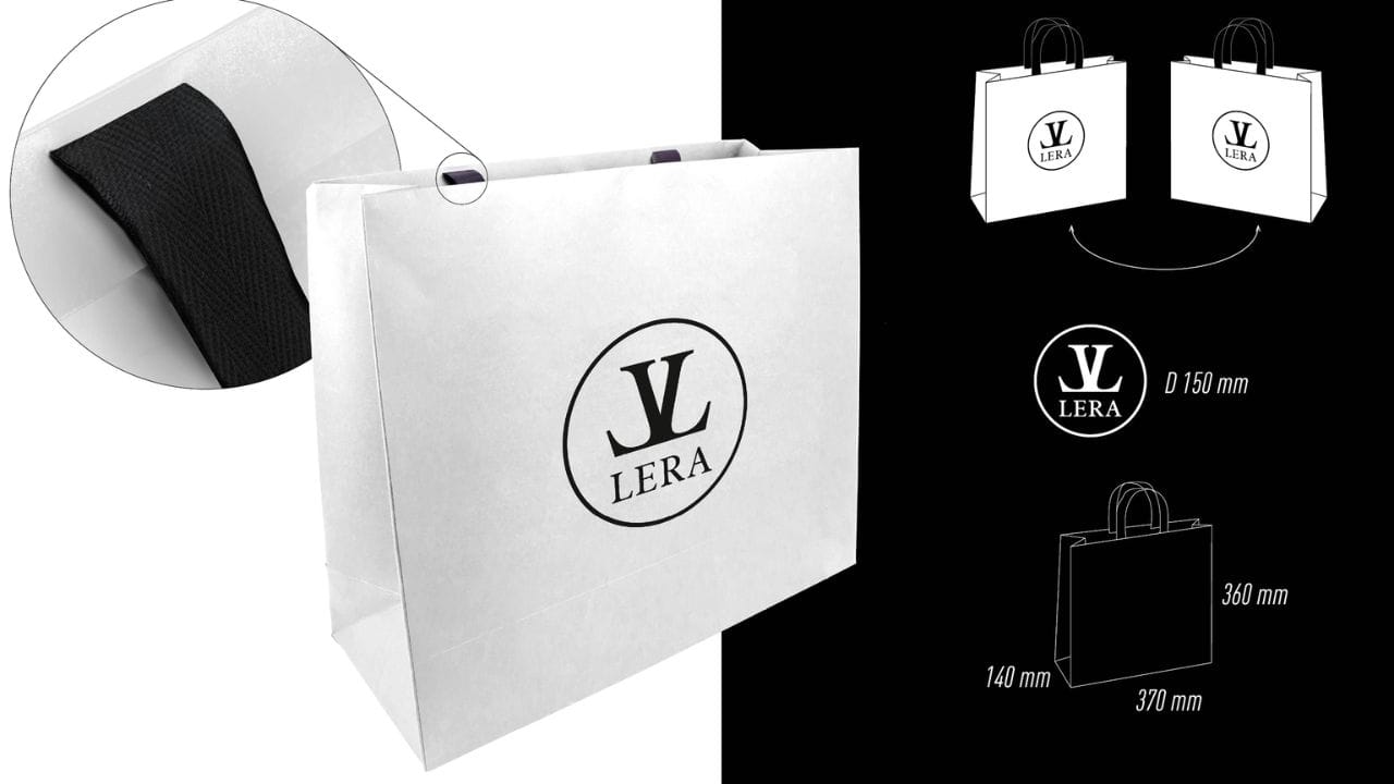 Пакет картонний з вклеєними ручками фотографія